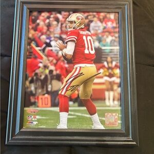 Framed Black and Gold Football Photo